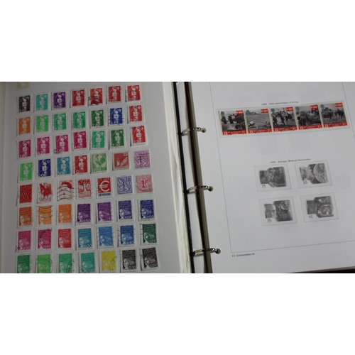 88 - 2 ALBUMS OF POSTAGE STAMPS