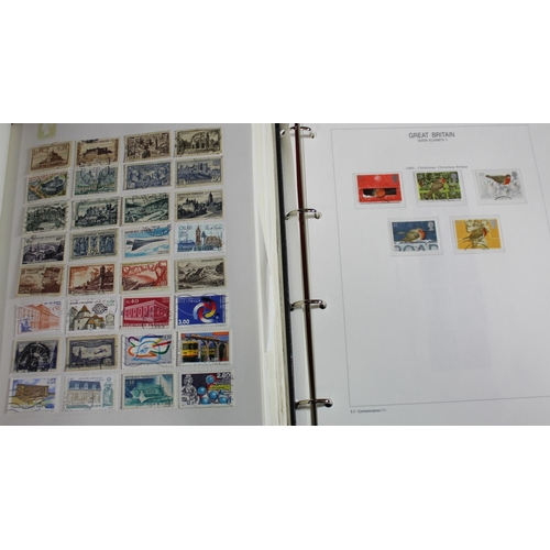 88 - 2 ALBUMS OF POSTAGE STAMPS