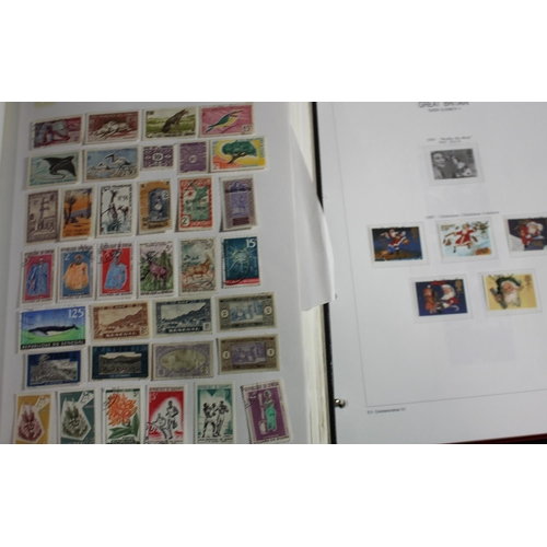 88 - 2 ALBUMS OF POSTAGE STAMPS