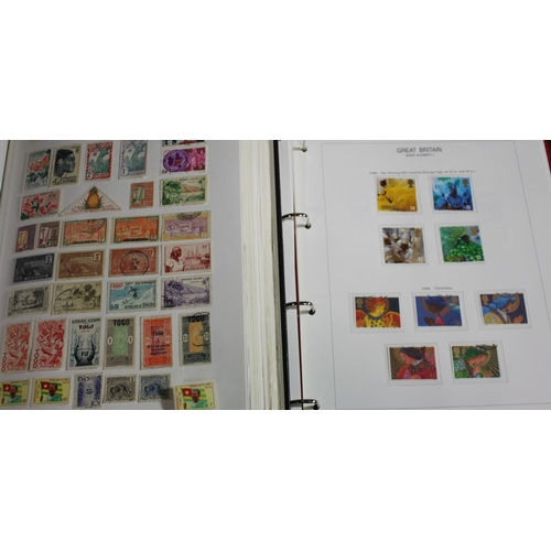 88 - 2 ALBUMS OF POSTAGE STAMPS