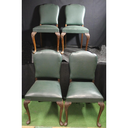 35 - 4 LEATHER SEAT AND BACK DINING CHAIRS - 1 LEG REPAIRED