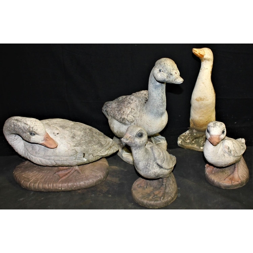 45 - 4 CONCRETE DUCK ORNAMENTS & 1 GOOSE ORNAMENT