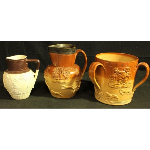 88 - RELIEF MOULDED STONEWARE 3 HANDLED MUG c1830 (6.5 DIAMETER, 6