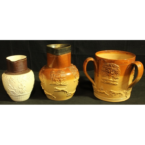 88 - RELIEF MOULDED STONEWARE 3 HANDLED MUG c1830 (6.5 DIAMETER, 6