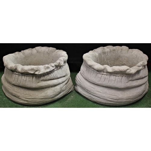 120 - PAIR STONEWORK SACK SHAPED PLANTERS