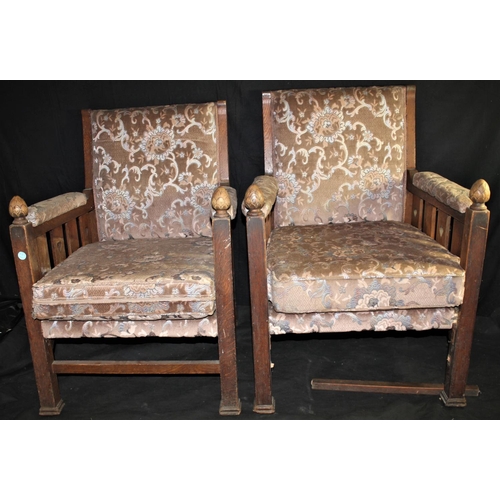 122 - PAIR OAK FRAMED ARMCHAIRS WITH UPHOLSTERED SEATS, BACKS & ARMS - 1 STRETCHER DAMAGED