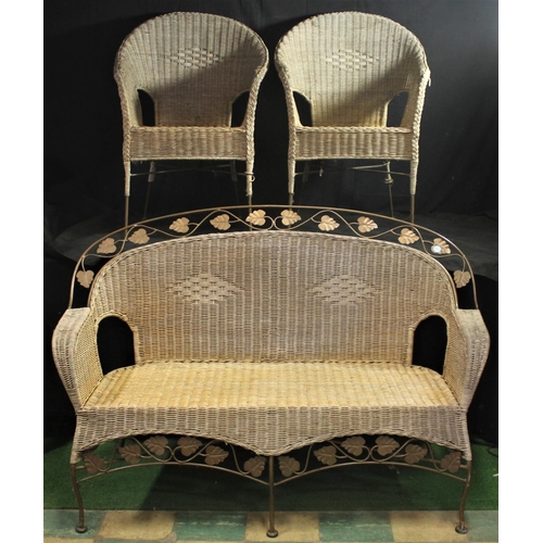 294 - IRON FRAME WICKER CONSERVATORY SUITE COMPRISING SOFA WITH LEAF PATTERN & 2 ARMCHAIRS