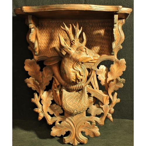 205 - OAK WALL BRACKET WITH CARVED STAG, HUNTING HORN & REFLE SURROUNDED BY ACORNS & LEAVES c1890