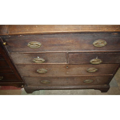 252 - LARGE GEORGIAN OAK BUREAU ON BRACKET FEET WITH BRASS DROP HANDLES