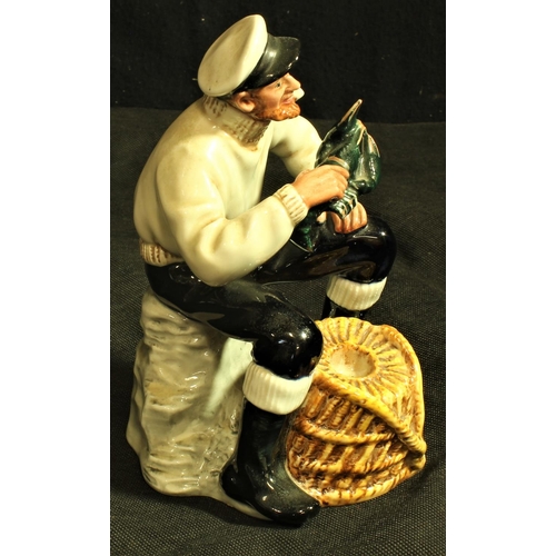 323 - ROYAL DOULTON FIGURINE, THE LOBSTER MAN HN2323