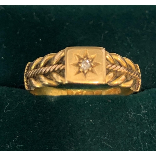 350 - 18ct GOLD ROPE PATTERN RING WITH 8 POINTED STAR, SET SINGLE CLEAR STONE - SIZE R (3.7g)