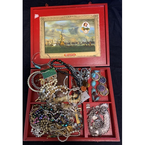 364 - WOOD 'GLORIA' CIGAR BOX OF COSTUME JEWELLERY INCLUDING 2 SILVER COLOURED CHARM BRACELETS, COIN BRACE... 