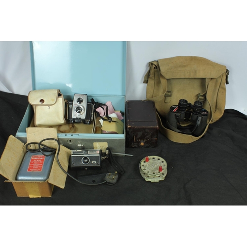 61 - TIN OF MISCELLANEOUS GOODS: BINOCULARS, CAMERAS, FLY REEL ETC