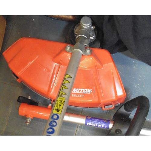 69 - MITOX 28MT PETROL GARDEN MULTI-TOOL WITH ATTACHMENTS (PETROL ITEM SOLD AS VIEWED)