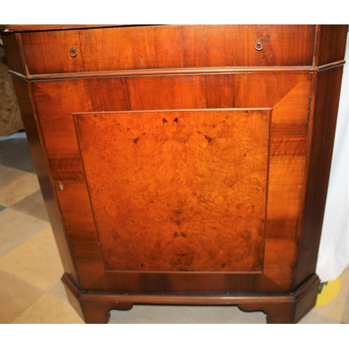 104 - MAHOGANY CORNER GLAZED DOOR SECRETAIRE WITH PULL OUT WRITING DRAWER, OVER CUPBOARD BASE