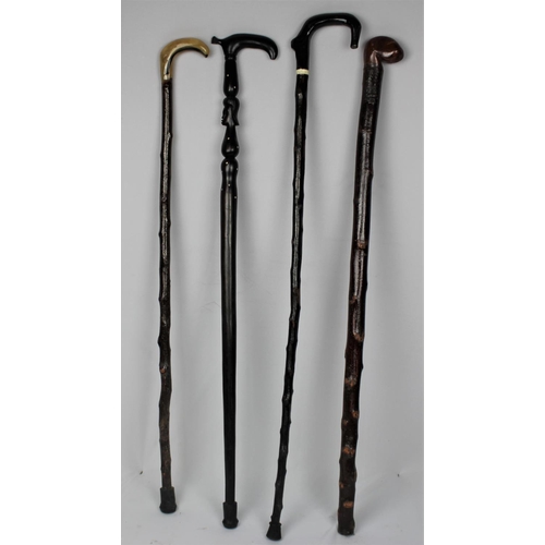 116 - 4 WALKING STICKS