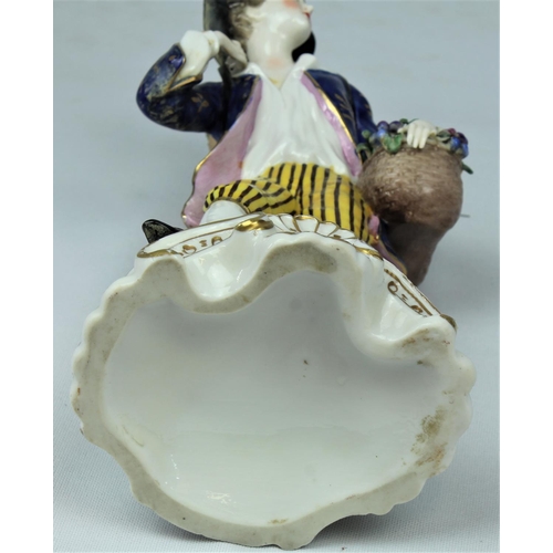 149 - PORCELAIN FIGURINE OF FRUIT SELLER - SOME DAMAGE