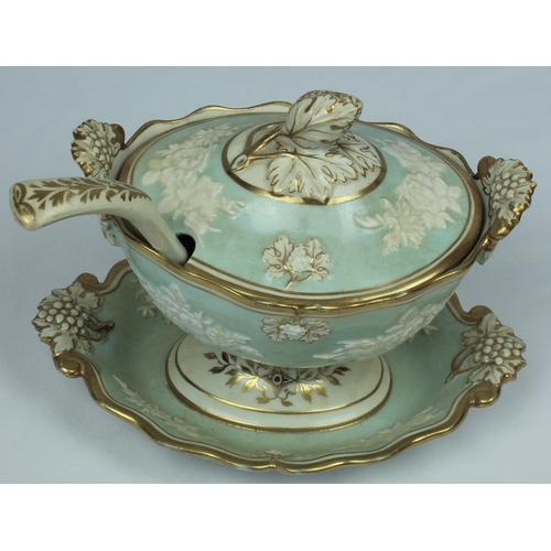 151 - GRAVY TUREEN WITH RAISED RELIEF AND GILT EDGES, C/W LADLE