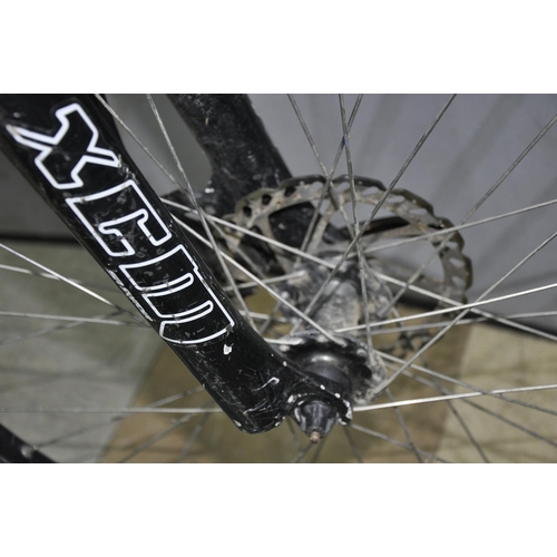 4 - CUBE CURVE 24 SPEED MOUNTAIN BIKE WITH FRONT SUSPENSION AND DISC BRAKE TO FRONT. 20