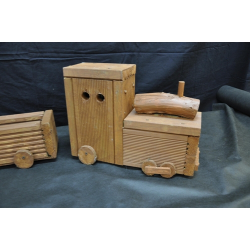 23 - RED WOODEN TRAIN WITH TWO SMALL PLANTERS&nbsp;AND THREE MINIATURE GARDEN BENCHES