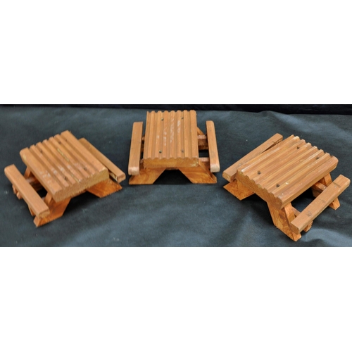 23 - RED WOODEN TRAIN WITH TWO SMALL PLANTERS&nbsp;AND THREE MINIATURE GARDEN BENCHES