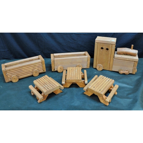23 - RED WOODEN TRAIN WITH TWO SMALL PLANTERS&nbsp;AND THREE MINIATURE GARDEN BENCHES