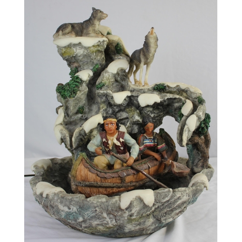 56 - WATER FEATURE OF NATIVE AMERICANS IN CANOE WITH DOGS/WOLVES