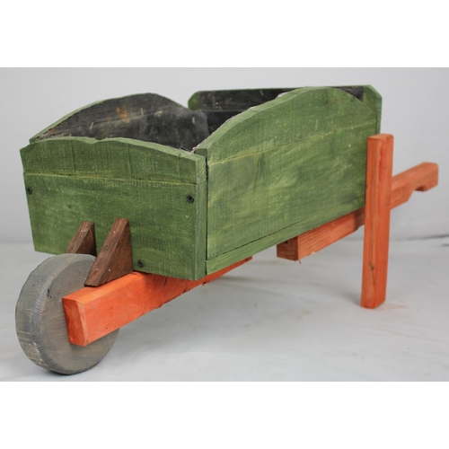 44 - STAINED WHEELBARROW GARDEN PLANTER (L 84cm W 36cm H 32cm)