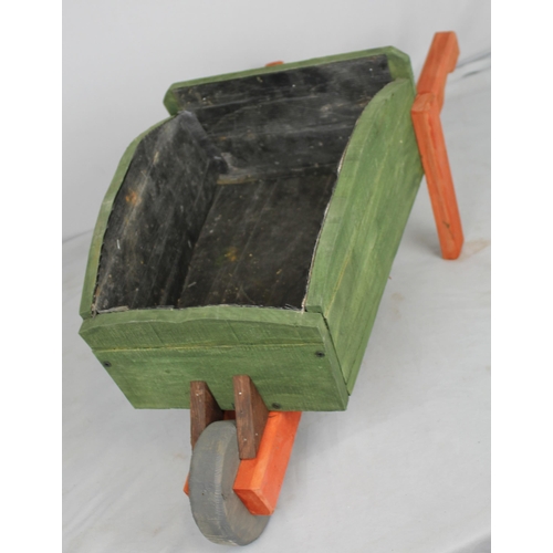 44 - STAINED WHEELBARROW GARDEN PLANTER (L 84cm W 36cm H 32cm)