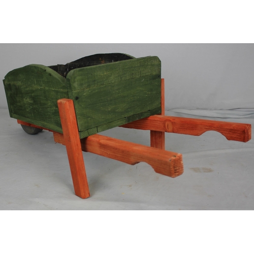 44 - STAINED WHEELBARROW GARDEN PLANTER (L 84cm W 36cm H 32cm)