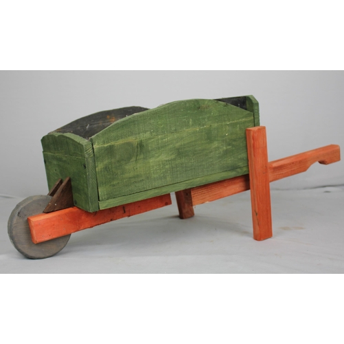 44 - STAINED WHEELBARROW GARDEN PLANTER (L 84cm W 36cm H 32cm)
