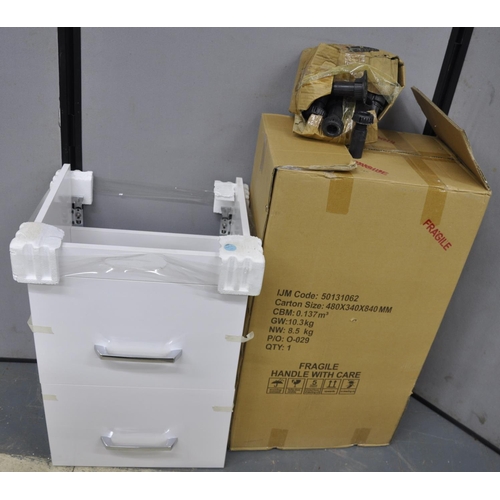 60 - WHITE BATHROOM CUPBOARD PEDESTAL, 2 DRAWER BATHROOM PEDESTAL AND A BOX OF PEDESTAL/CUPBOARD FEET
