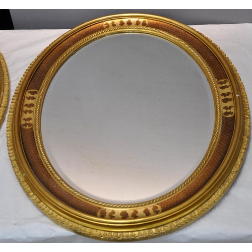 82 - PAIR OF OVAL DECORATIVE GILT FRAMED, BEVEL EDGE MIRROR