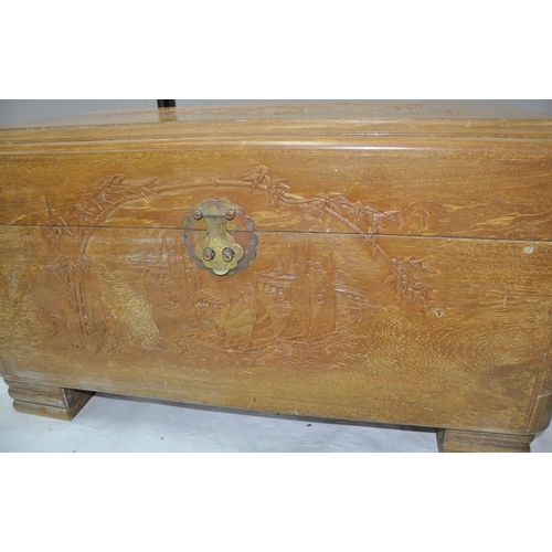 168 - CARVED ORIENTAL CAMPHOR WOOD CHEST WITH BRASS DETAIL