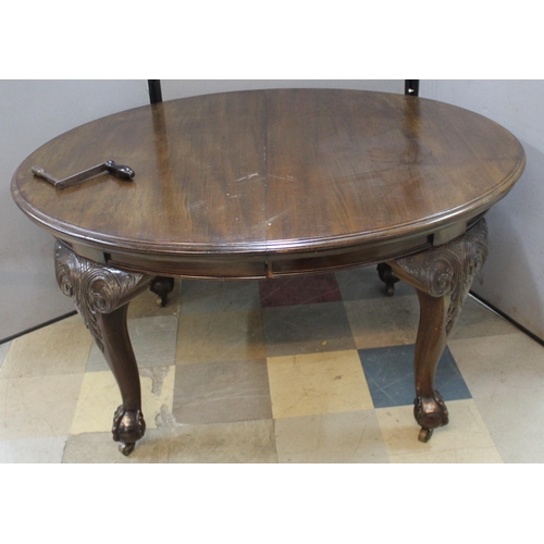 69 - MAHOGANY WIND OUT DINING TABLE WITH 2 EXTENSION LEAVES