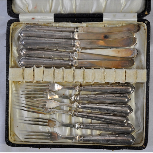 93 - SET OF SIX SILVER HANDLED KNIVES AND FORKS