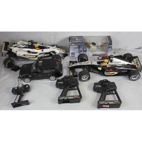 109 - 3 REMOTE CONTROL CARS (ONE DAMAGED) AND 1 REMOTE CONTROL HELICOPTER