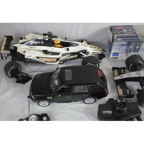 109 - 3 REMOTE CONTROL CARS (ONE DAMAGED) AND 1 REMOTE CONTROL HELICOPTER