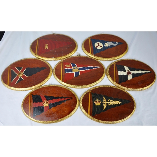 148 - 7 WOODEN PLAQUES OF SAILING FLAGS - POSSIBLY HAND PAINTED (SOME SCRATCHED/MARKED)