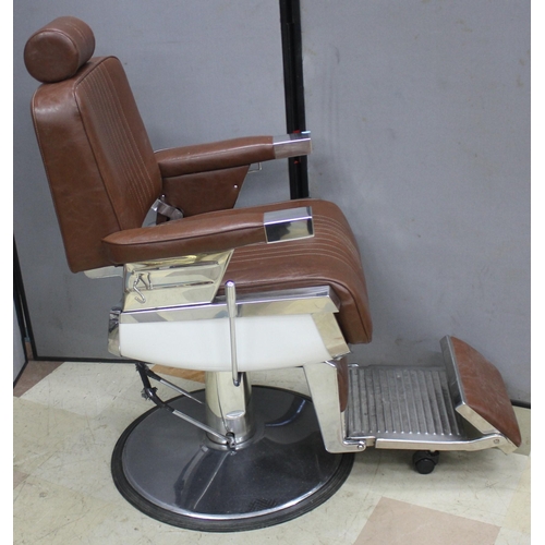 183 - BROWN UPHOLSTERED BARBER'S CHAIR - WITH HEAD REST (2 SPLITS IN HEAD REST)