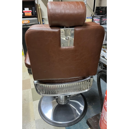 183 - BROWN UPHOLSTERED BARBER'S CHAIR - WITH HEAD REST (2 SPLITS IN HEAD REST)