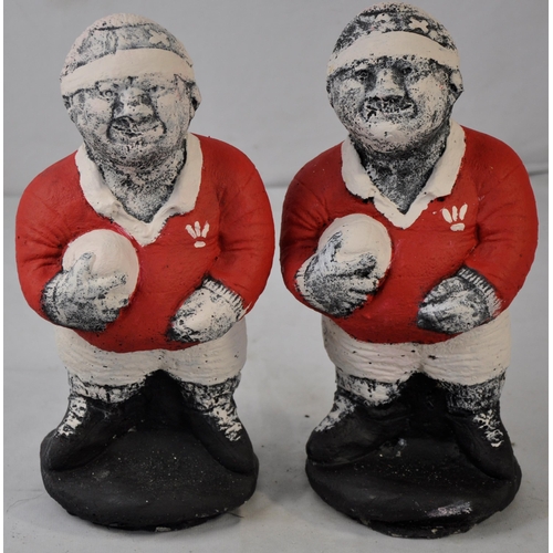 212 - PAIR OF WELSH RUGBY PLAYERS GARDEN ORNAMENTS