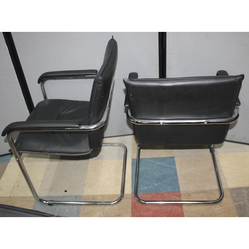 229 - 4 BLACK AND CHROME ARMCHAIRS