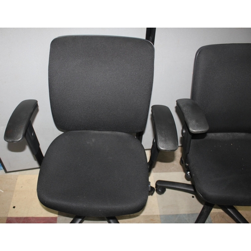 134A - 3 BLACK SWIVEL OFFICE ARMCHAIRS