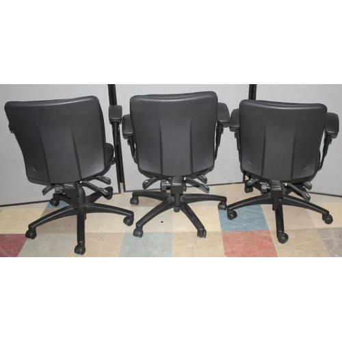 134A - 3 BLACK SWIVEL OFFICE ARMCHAIRS