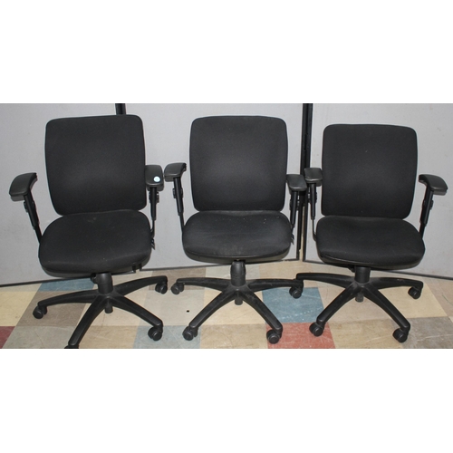 134A - 3 BLACK SWIVEL OFFICE ARMCHAIRS