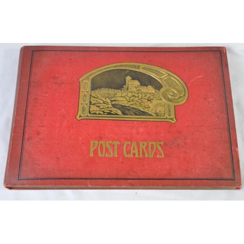 296 - RED POSTCARD ALBUM OF POSTCARDS