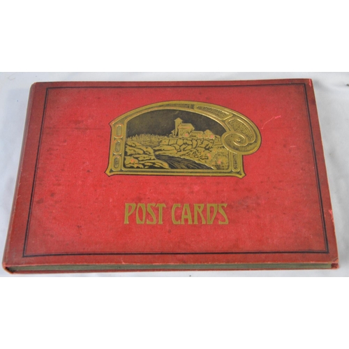 296 - RED POSTCARD ALBUM OF POSTCARDS