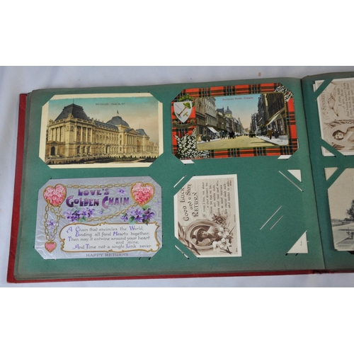 296 - RED POSTCARD ALBUM OF POSTCARDS