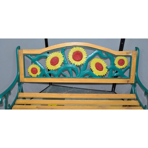 75 - CAST IRON AND WOOD GARDEN BENCH WITH SUNFLOWER DECORATION